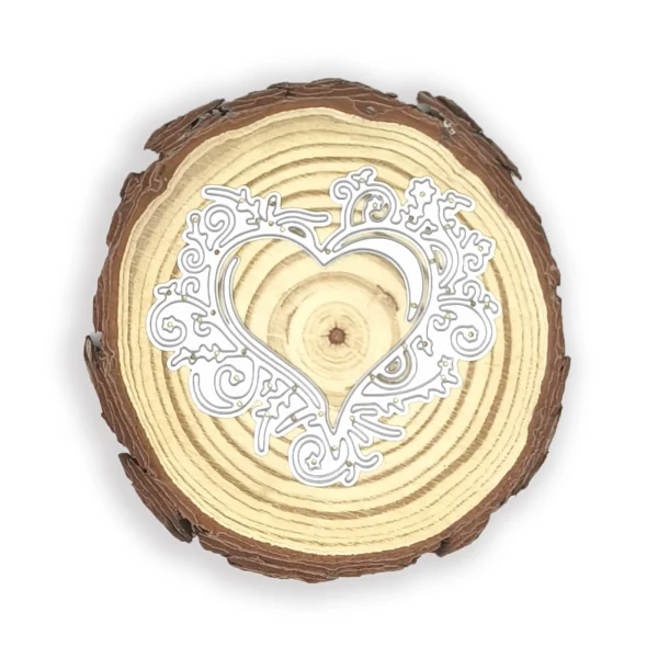 Troquel corazón con borde decorado 70 × 80 mm para scrapbooking y tarjetería; suaje calado compatible con Big Shot; ideal como marco o ventana shaker